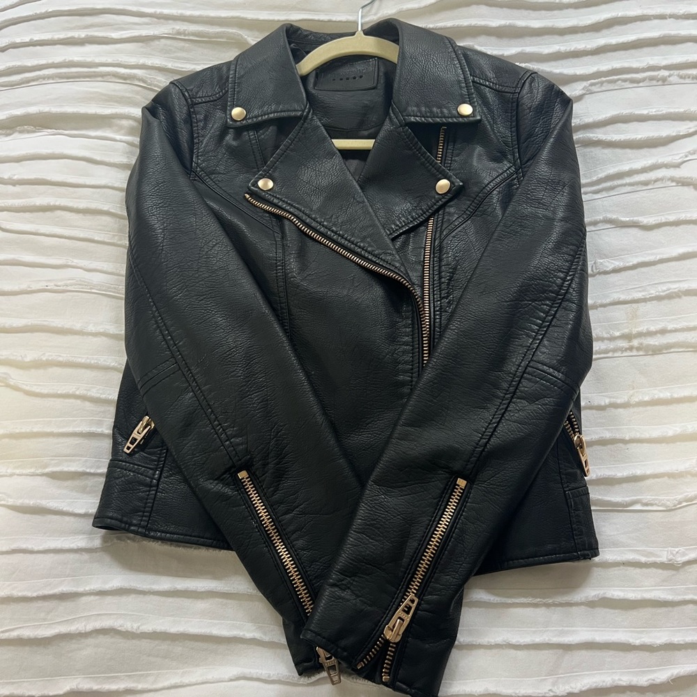 Great condition Blank NYC black faux leather jacket with gold hardware